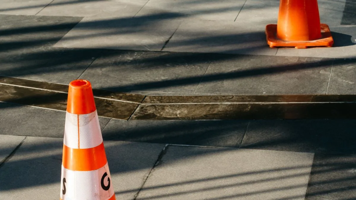 Traffic cones and barricades prepared for safe work-zone traffic control.