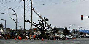 A construction crew is working on a street in vancouver.